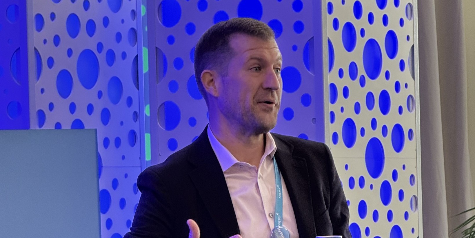 Chris Keller speaking at a legal industry event